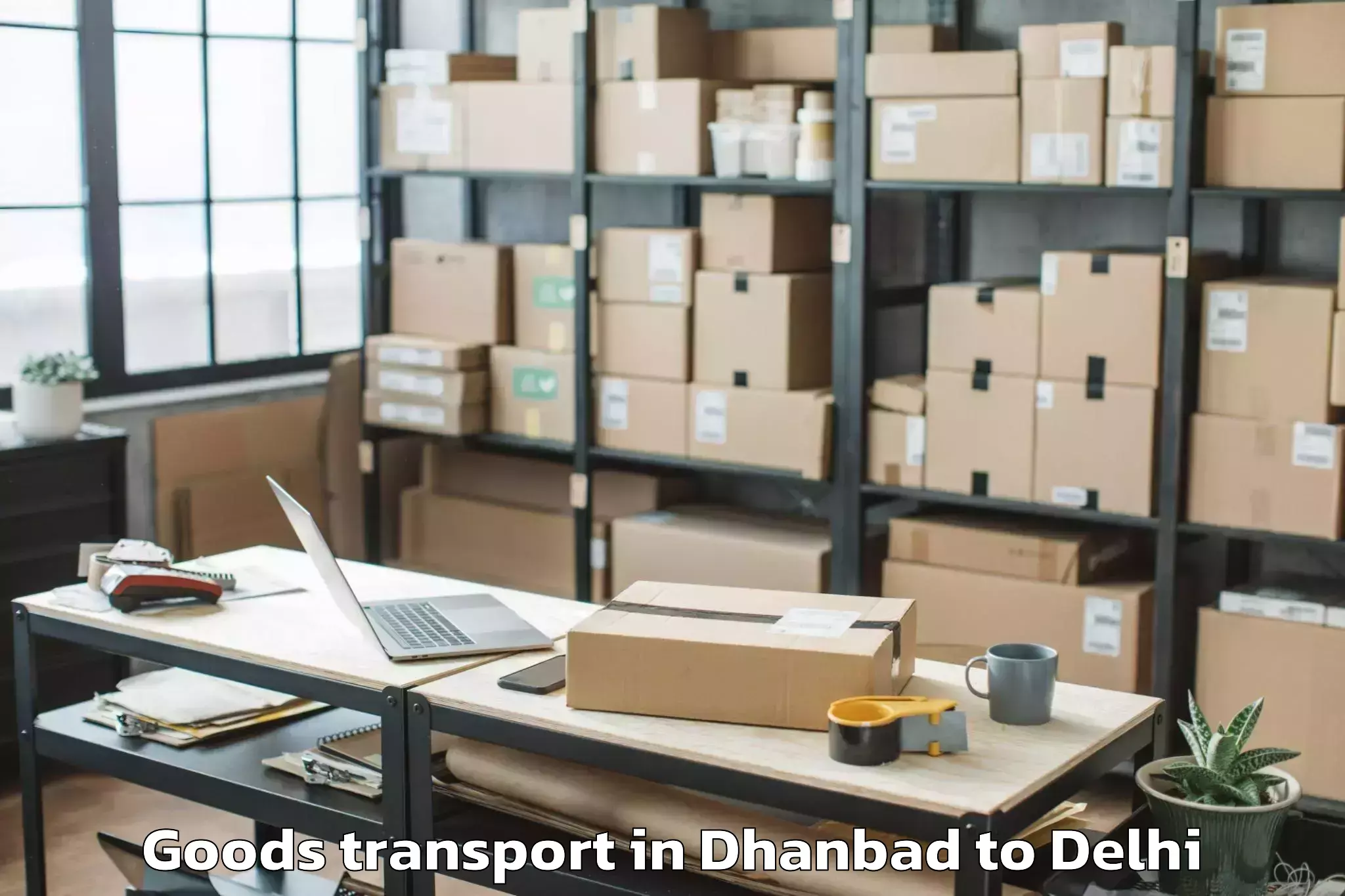 Book Your Dhanbad to South Asian University New Del Goods Transport Today